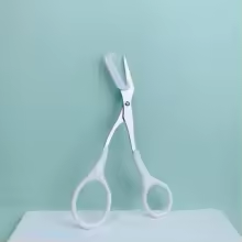 Eyebrow trimming scissors with built-in comb